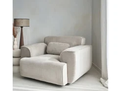 Sillón de pana con cojín gris beige