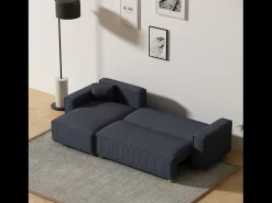 Sofá esquinero convertible de pana azul COSY